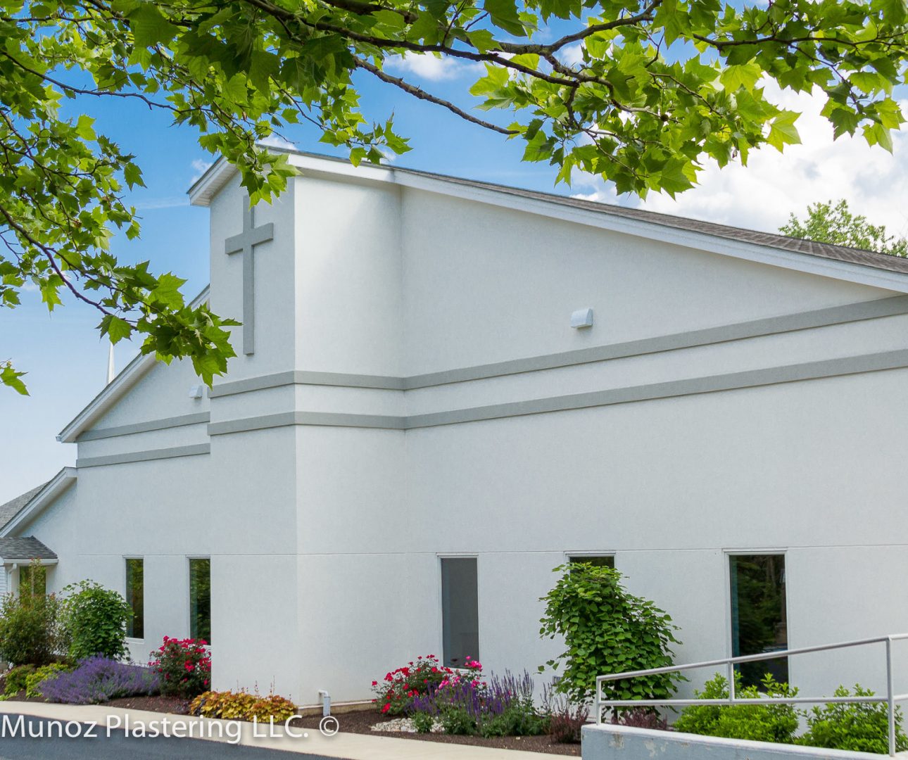 Smooth acrylic finish in an EIFS system