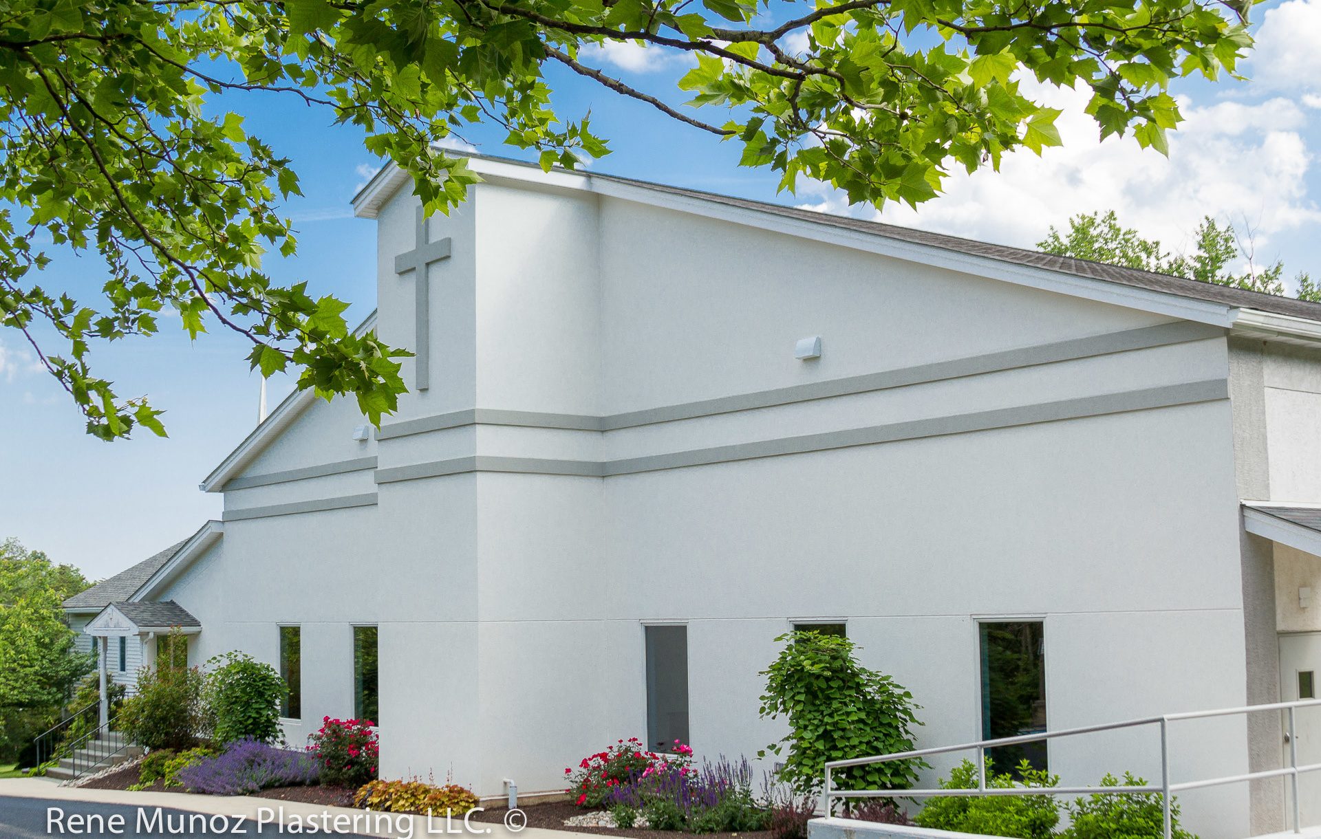 Smooth acrylic finish in an EIFS system