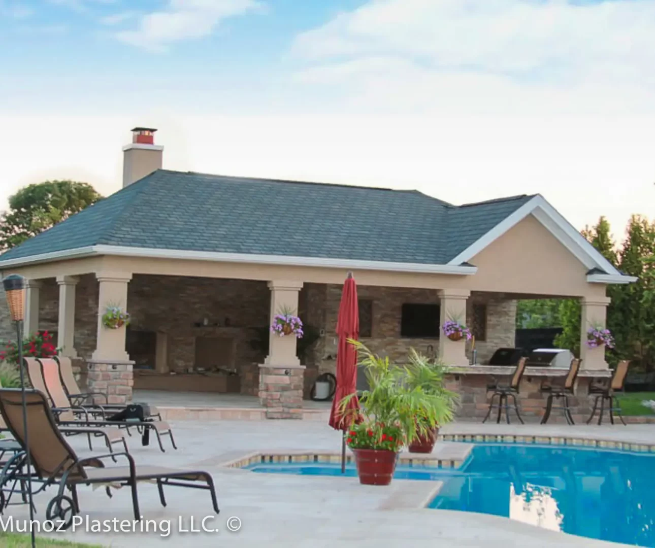 Stucco pool house and pillars